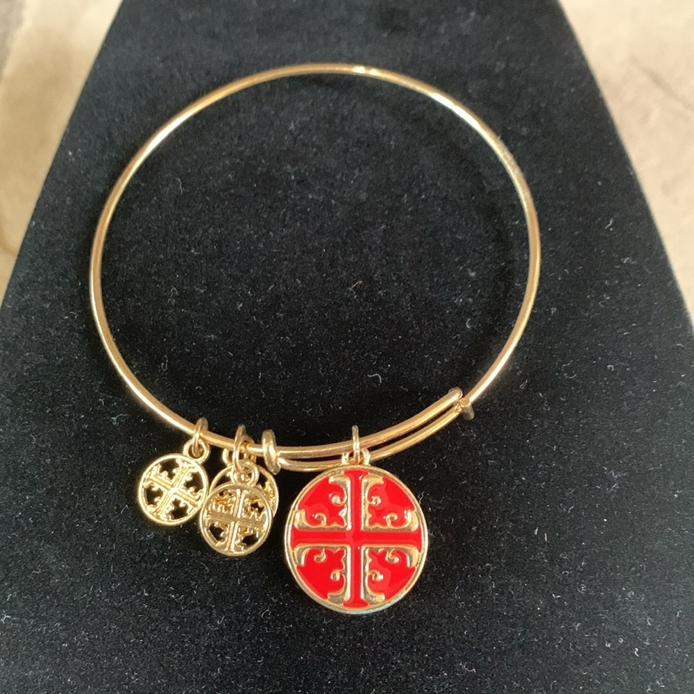 Tory Burch red/gold and white/gold with three gold charms bracelet